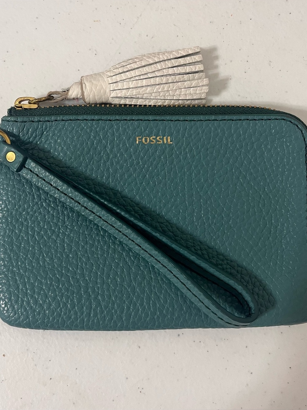 Fossil Tara Teal Leather Wristlet with White Tassel
